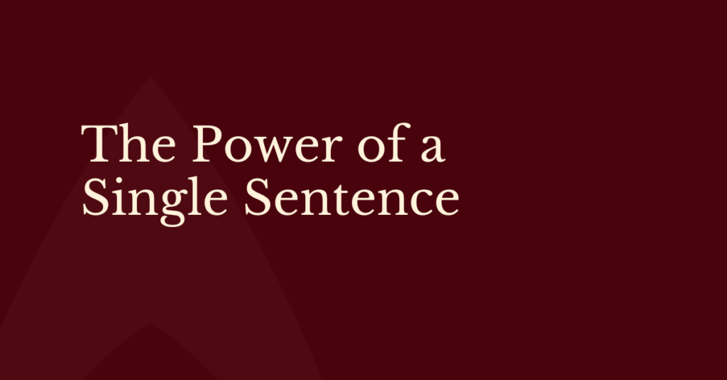 Dark maroon background with light beige text in two center‑aligned lines reading “The Power of a Single Sentence.”
